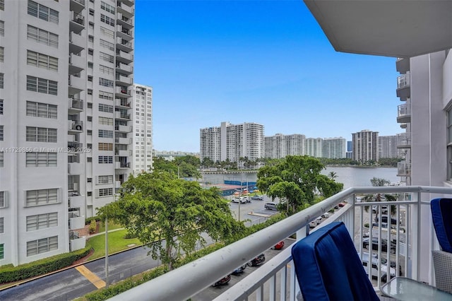 balcony featuring a water view