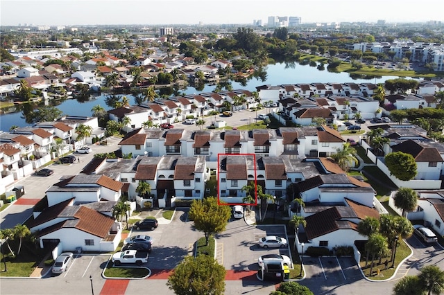 bird's eye view with a water view