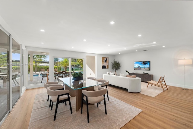 dining room featuring light wood-type flooring