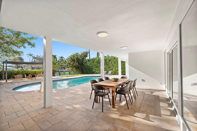 view of swimming pool featuring a pergola and a patio area