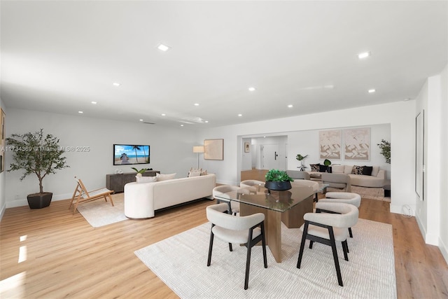 dining space featuring light hardwood / wood-style floors