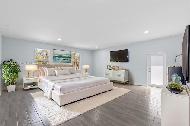 bedroom with hardwood / wood-style floors