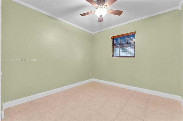 spare room featuring crown molding and ceiling fan