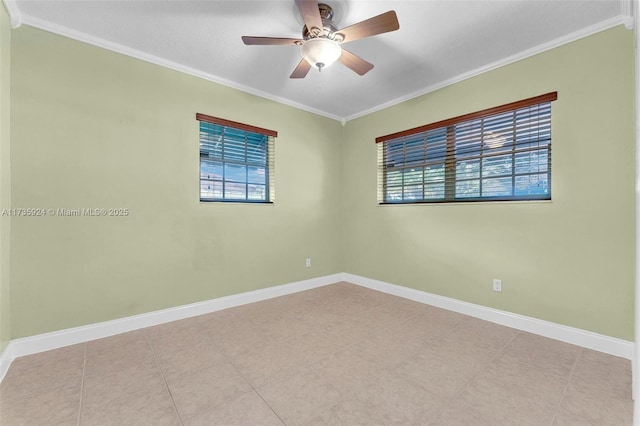 spare room with ceiling fan, a healthy amount of sunlight, and ornamental molding