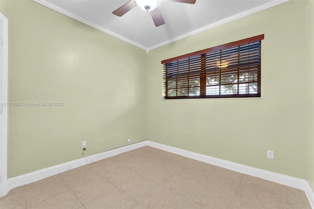 tiled spare room featuring crown molding and ceiling fan