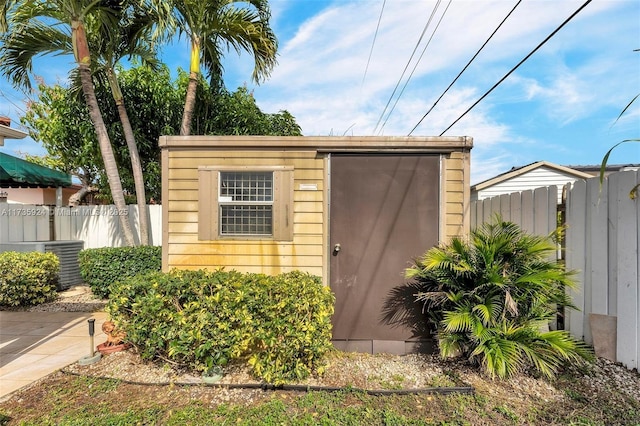 view of outbuilding featuring central AC unit