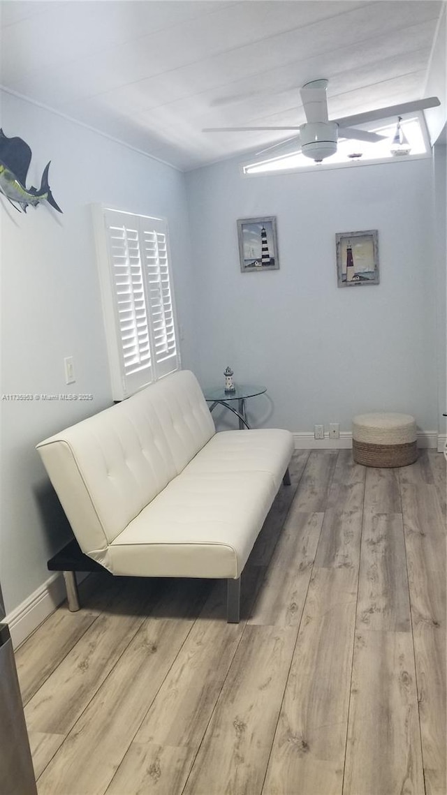 bedroom featuring wood-type flooring and multiple windows