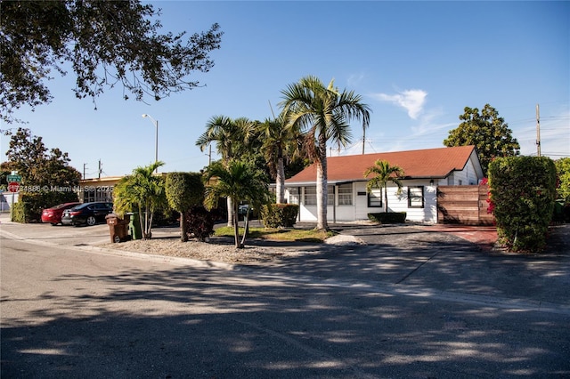 view of front of house with fence