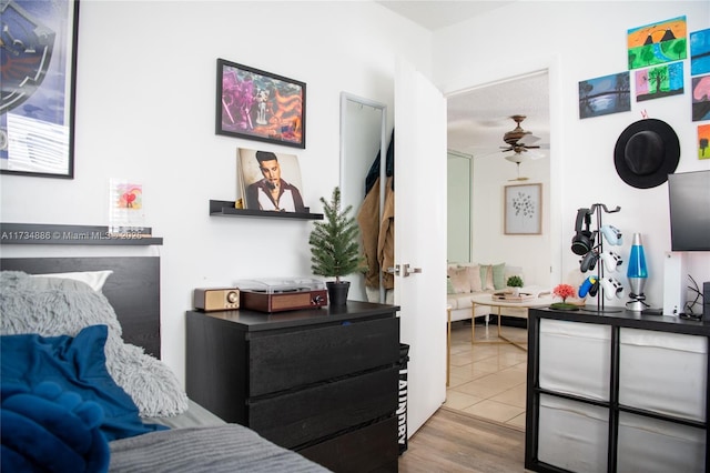 bedroom with hardwood / wood-style floors