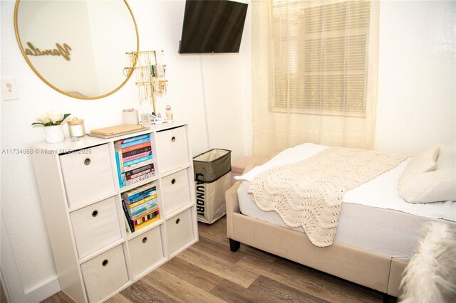 bedroom featuring hardwood / wood-style floors