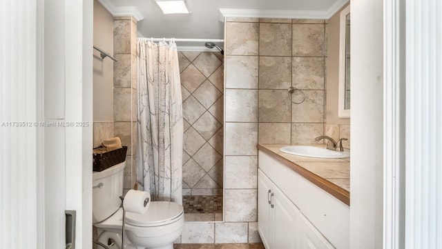 bathroom with ornamental molding, vanity, a shower with shower curtain, and tile walls