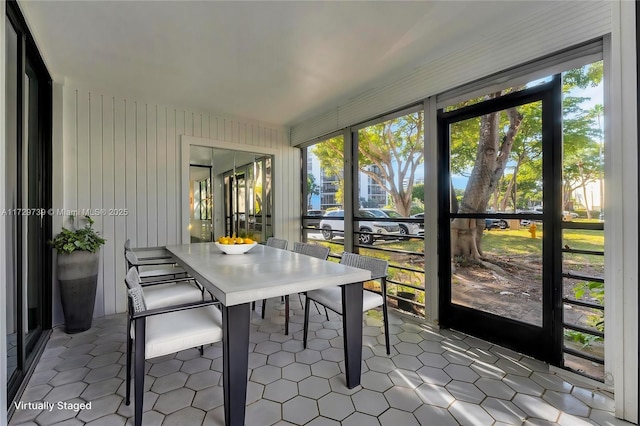 sunroom / solarium with plenty of natural light