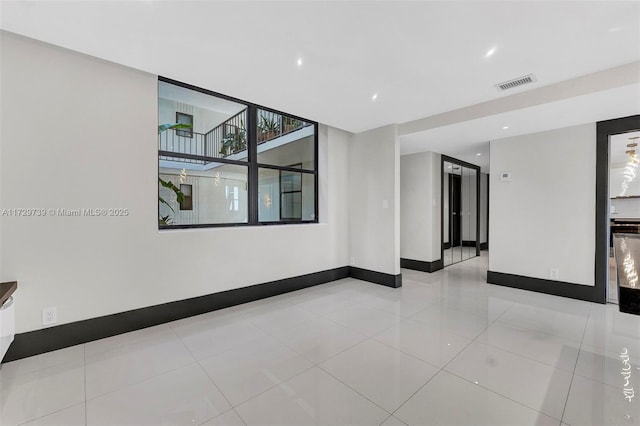 view of tiled spare room