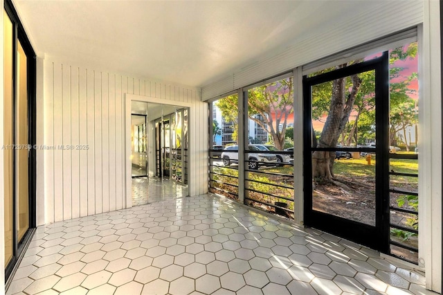 view of unfurnished sunroom