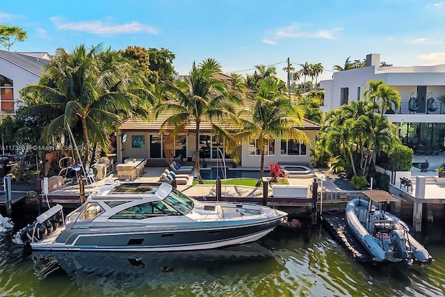 dock area featuring a water view