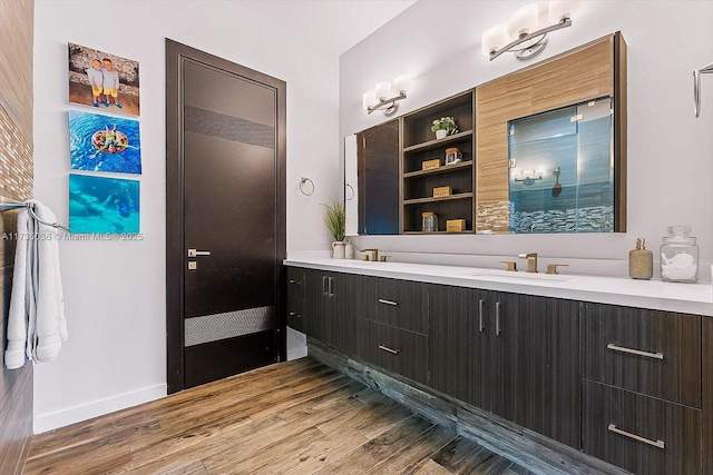 bathroom featuring vanity and hardwood / wood-style floors