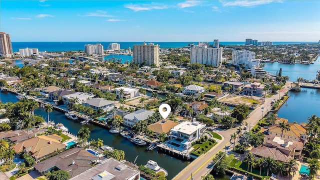 drone / aerial view with a water view