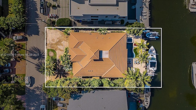 drone / aerial view featuring a water view