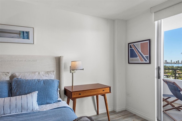 bedroom with light hardwood / wood-style floors