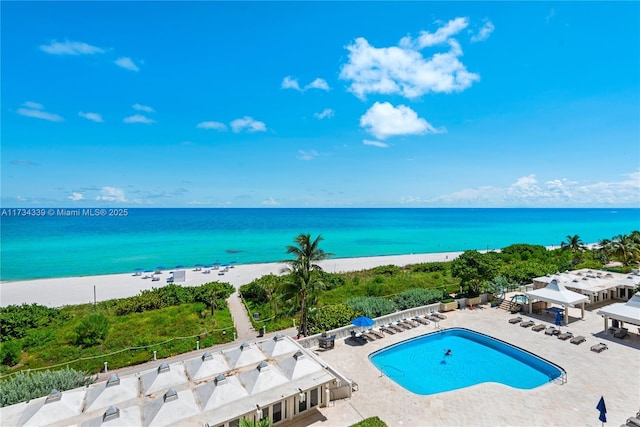 view of water feature with a beach view