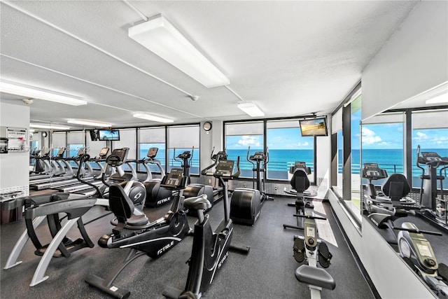 workout area featuring a textured ceiling