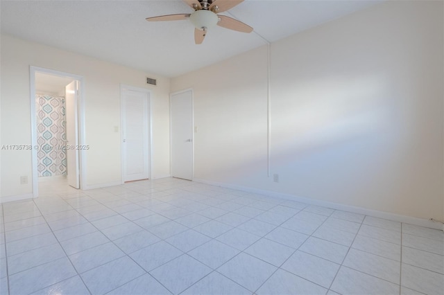 580 Egret Dr Unit 119, Hallandale Beach, FL 33009 - empty room featuring baseboards, ceiling fan, light tile patterned flooring, and visible vents