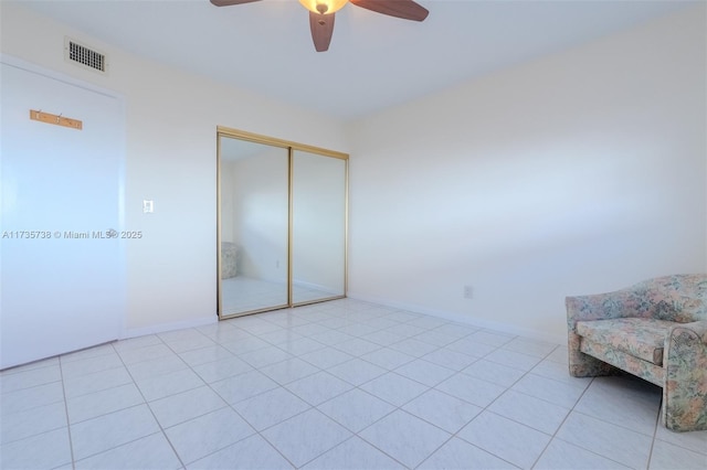 unfurnished room featuring ceiling fan