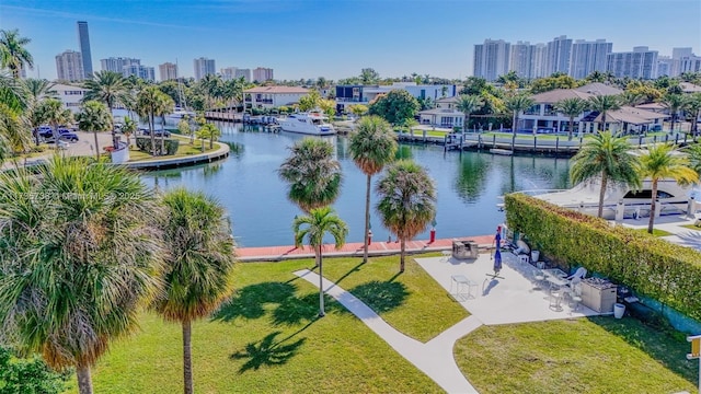 580 Egret Dr Unit 119, Hallandale Beach, FL 33009 - drone / aerial view featuring a view of city and a water view