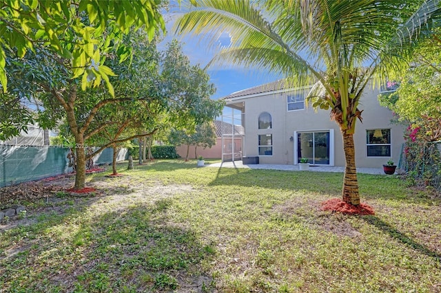 view of yard with a lanai