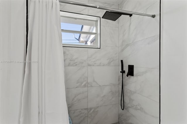 bathroom featuring a shower with curtain