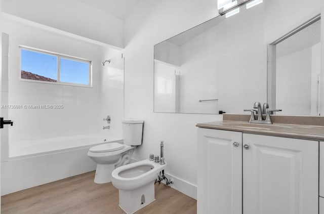 full bathroom featuring hardwood / wood-style flooring, a bidet, bathtub / shower combination, and toilet