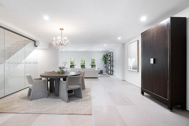 dining space featuring an inviting chandelier