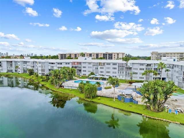 birds eye view of property with a water view