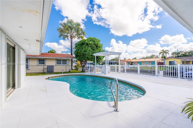 view of pool with a pergola, a patio area, and central AC