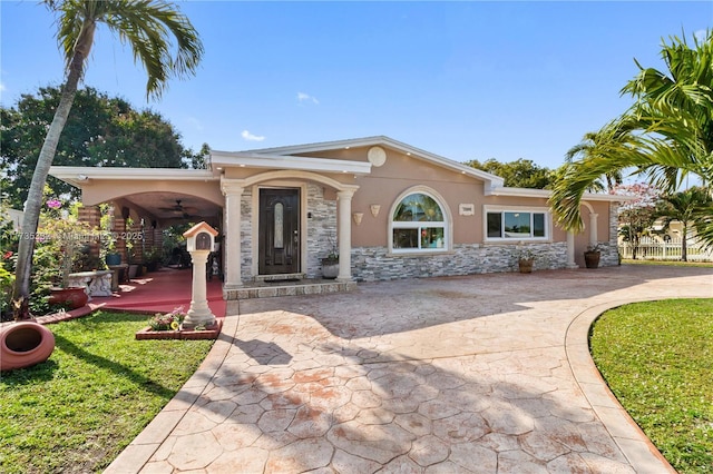 view of front of home with ceiling fan