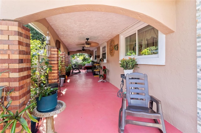 view of patio with ceiling fan