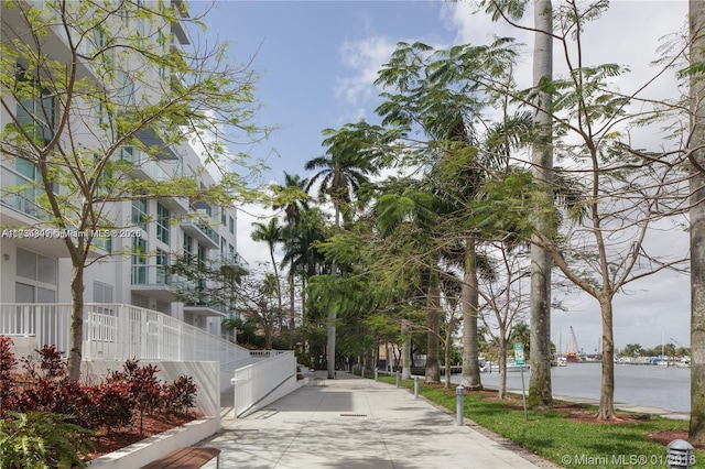 view of property's community featuring a water view