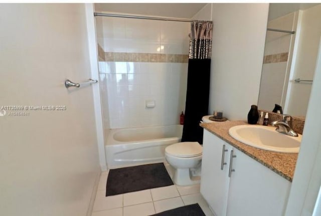 full bathroom with tile patterned flooring, vanity, shower / bath combination with curtain, and toilet