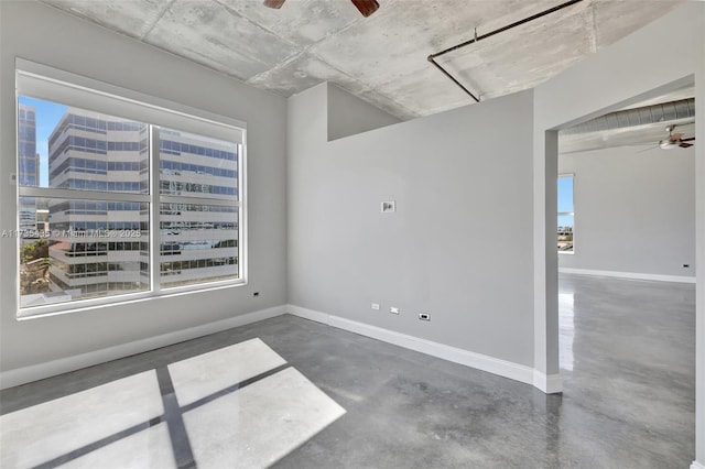 spare room with ceiling fan