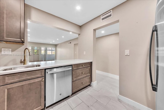 kitchen with dishwasher and sink