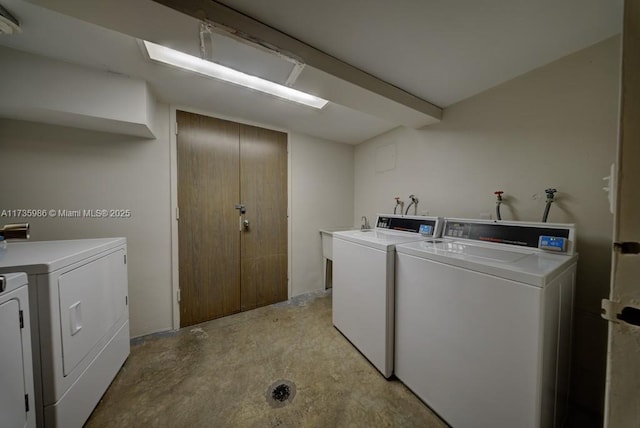 laundry area featuring washing machine and dryer