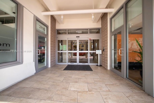 entrance to property featuring french doors