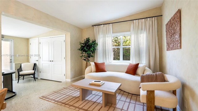 kitchen with hanging light fixtures, white cabinetry, appliances with stainless steel finishes, and kitchen peninsula