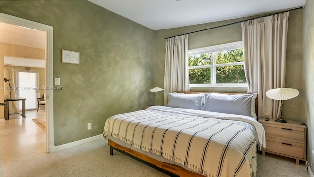 bedroom with baseboards