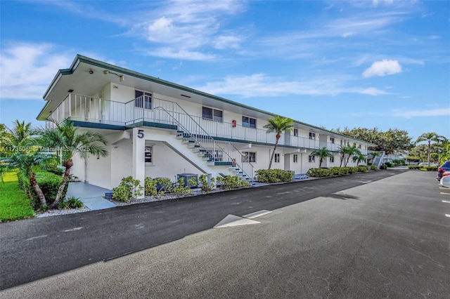 view of building exterior with cooling unit