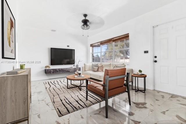 16025 NW 29th Ave, Miami Gardens, FL 33054 - living room featuring marble finish floor and a ceiling fan