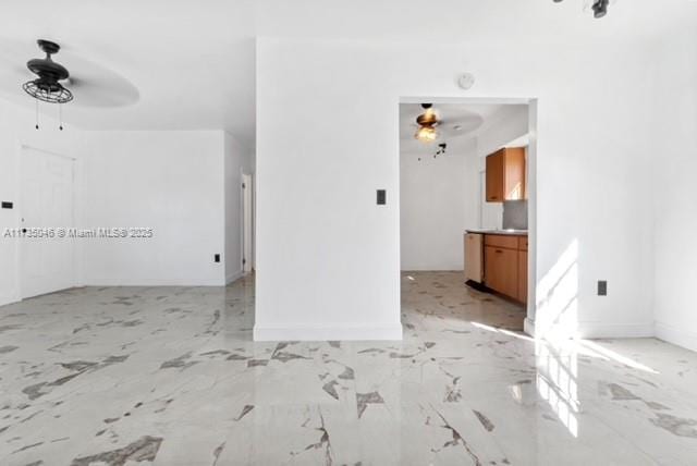 16025 NW 29th Ave, Miami Gardens, FL 33054 - spare room with marble finish floor, a ceiling fan, and baseboards