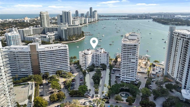 birds eye view of property featuring a water view