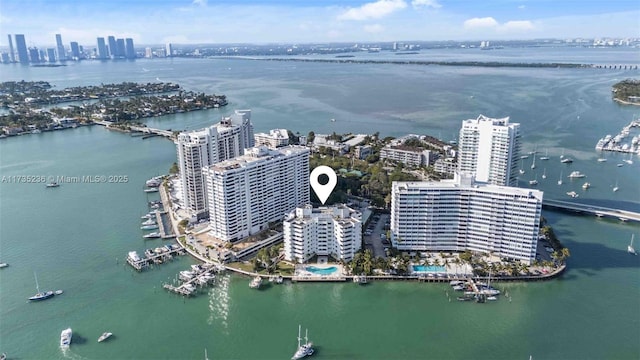 birds eye view of property featuring a water view