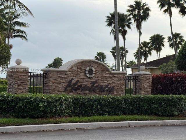 940 NE 33rd Ter Unit 102, Homestead, FL 33033 - view of community sign